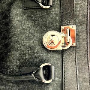 Beautiful Michael Kors black bag with Silver